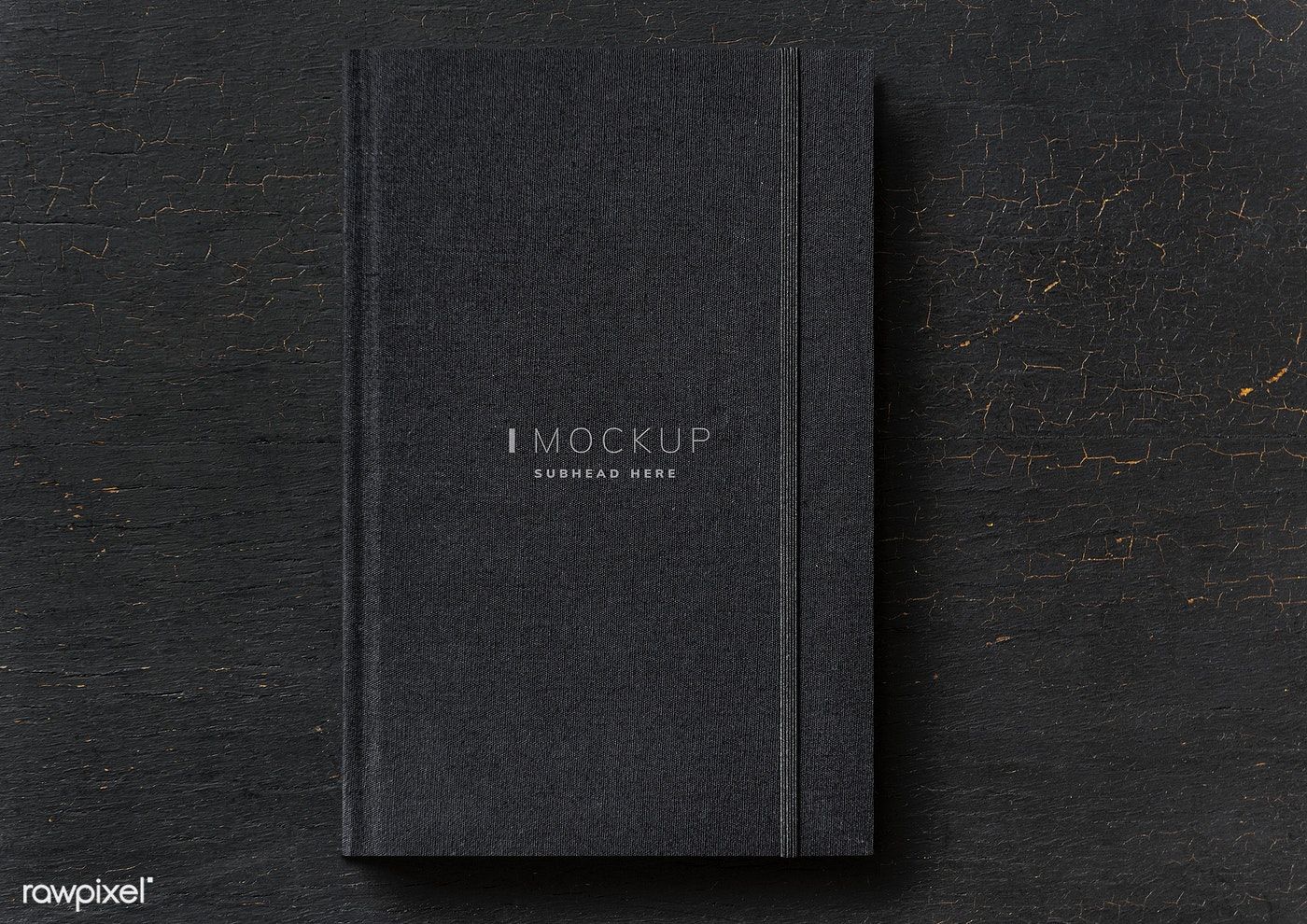 Download premium psd of Black notebook mockup on a black table 531810