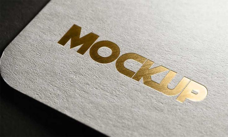 the logo for mockup is gold and silver